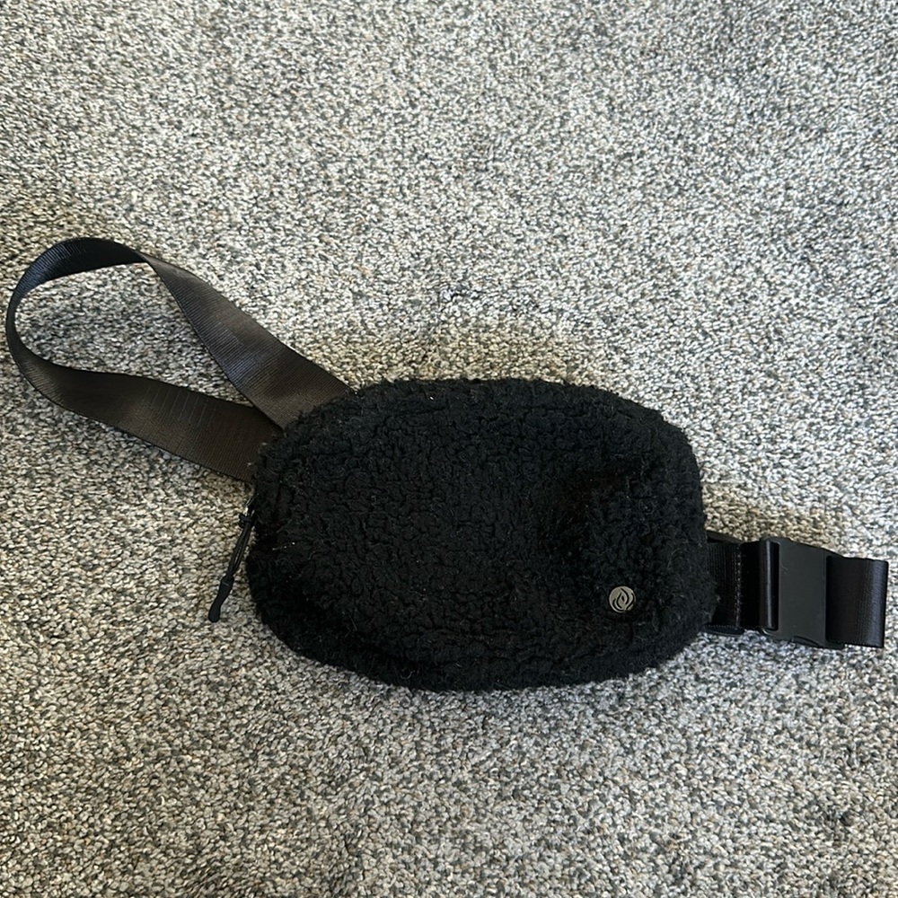 Fuzzy Sherpa like material. Belt bag.